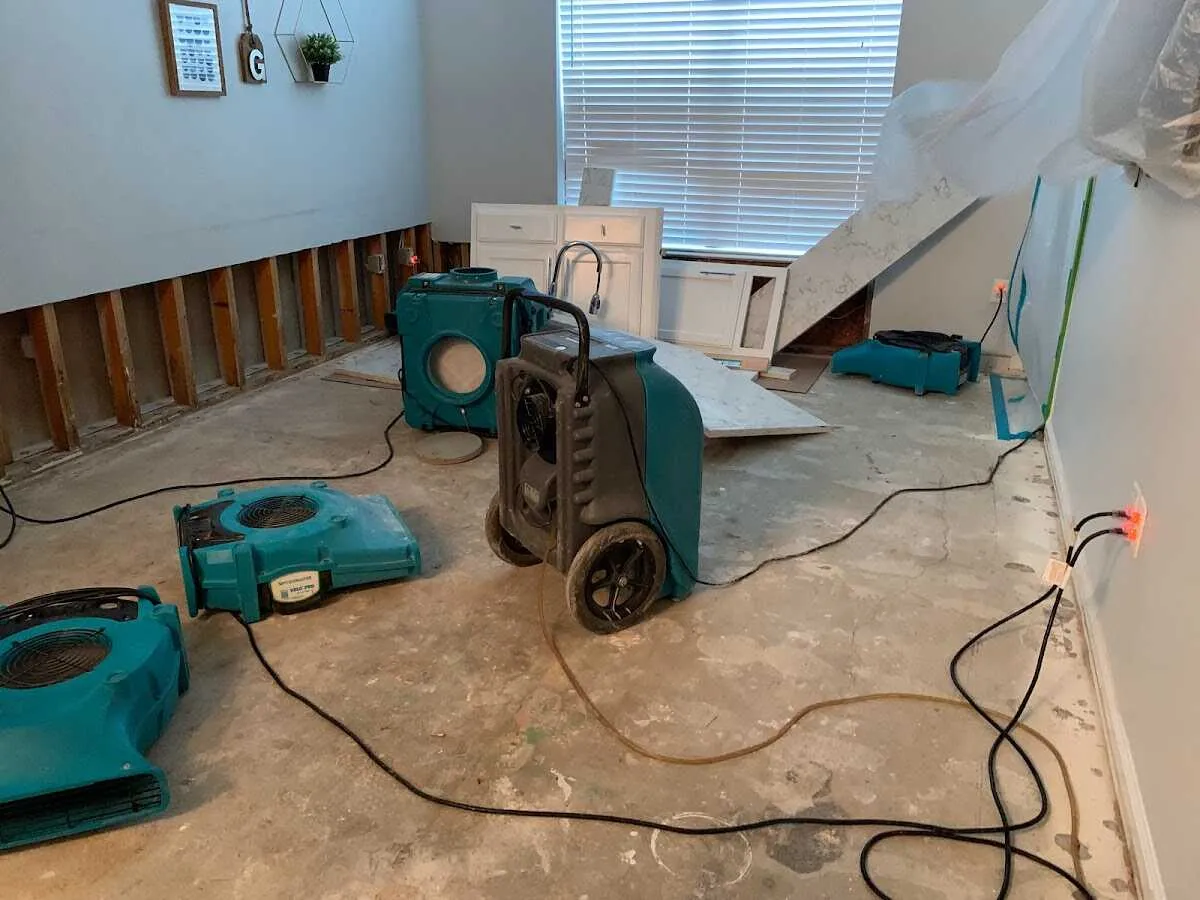 Dehumidifier in flood-cut room for Water Damage Restoration in Menomonee Falls
